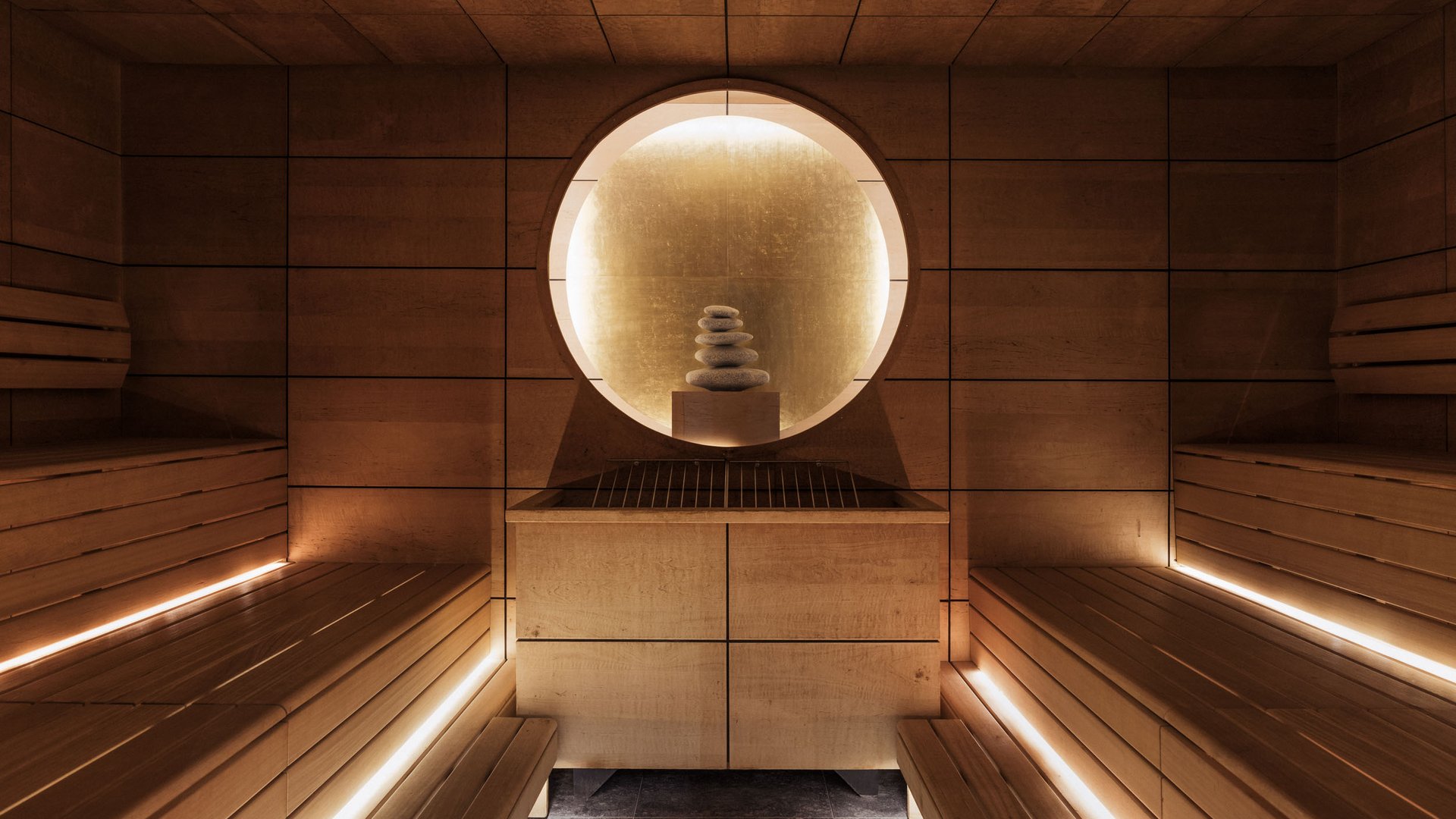 Modern sauna interior with wooden benches and ambient lighting
