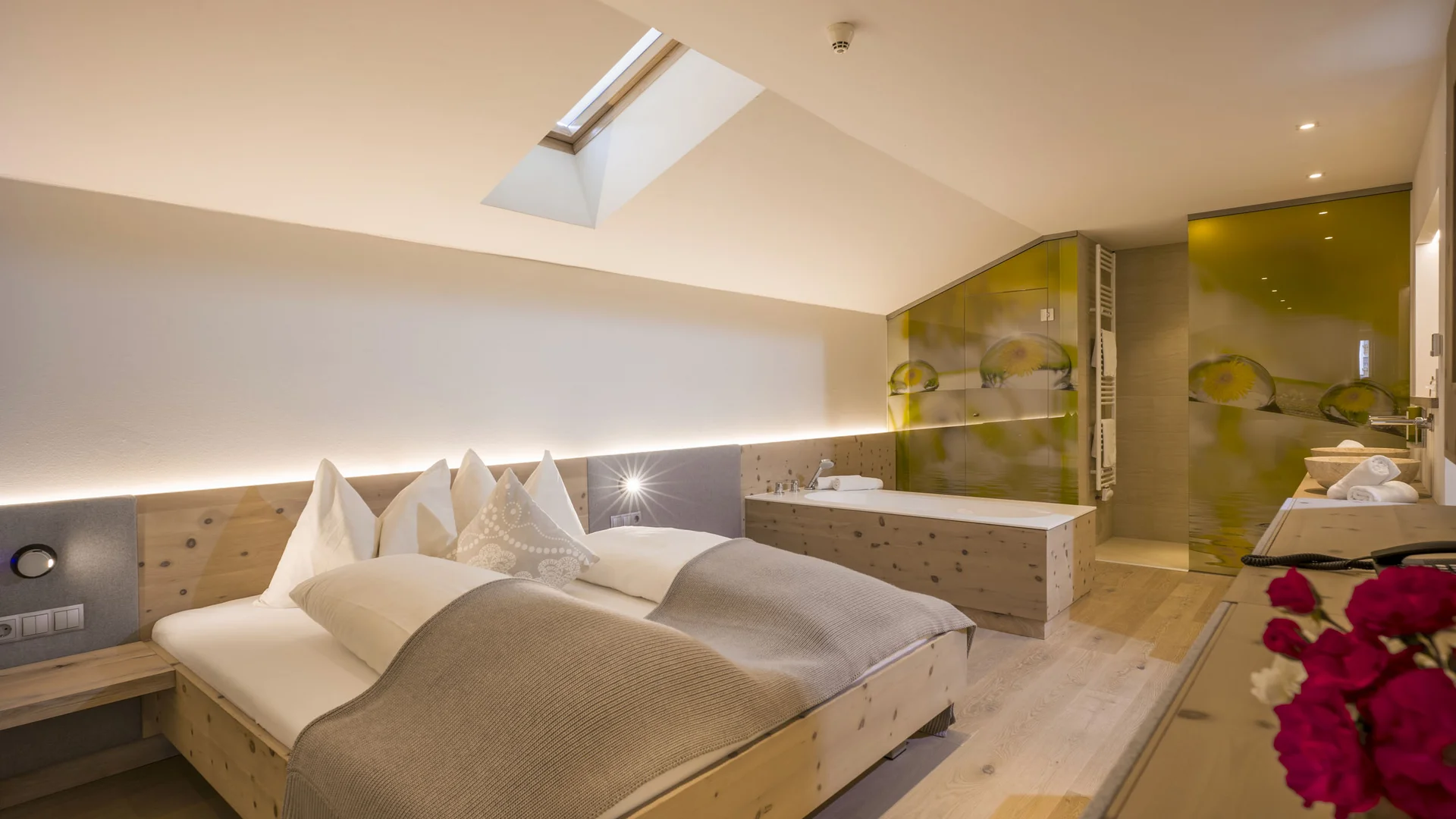 Hotel Thierseerhof **** Modern hotel room with double bed and bathtub under slanted ceiling
