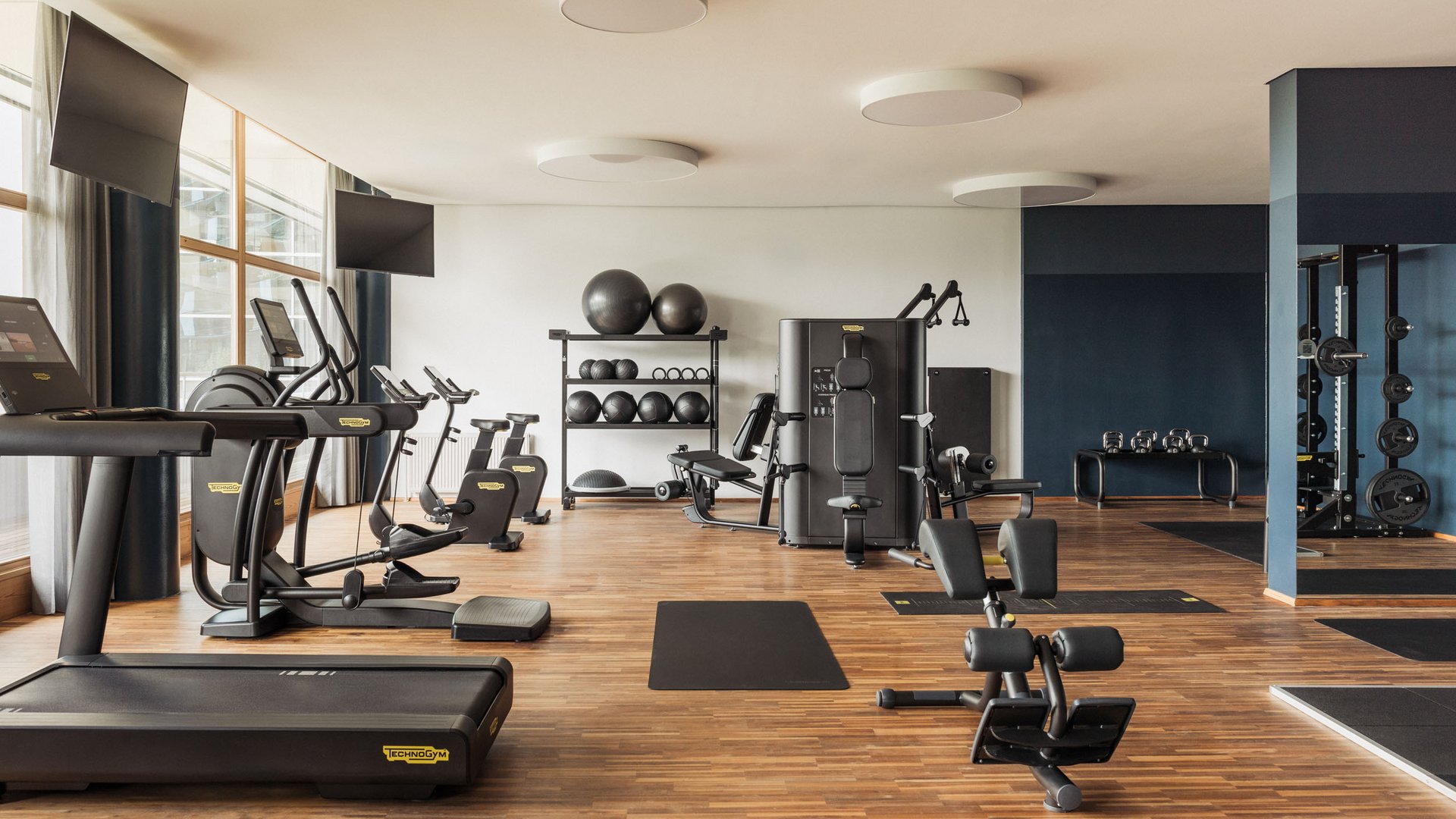 Modern gym with treadmills and workout equipment