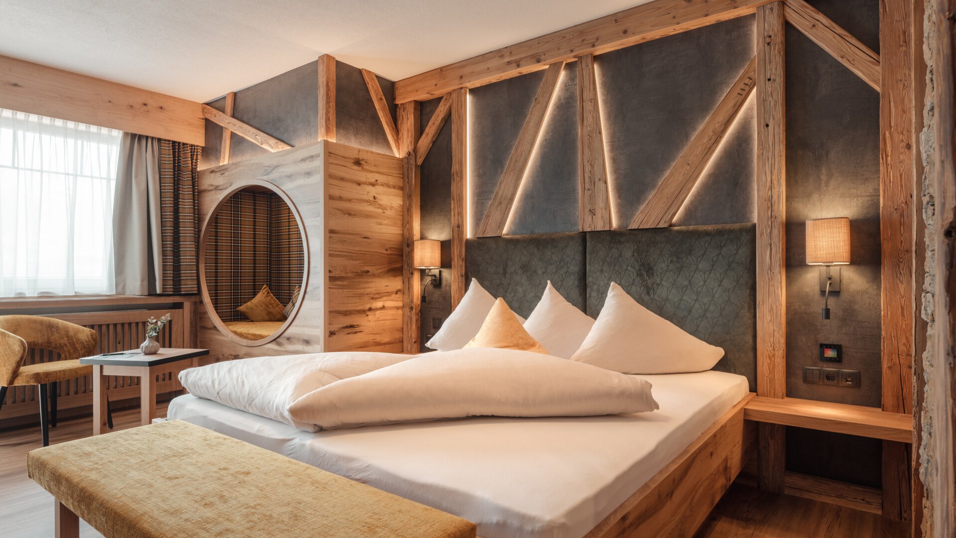Cozy modern hotel room with wooden furniture and comfortable bed