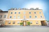 Collective enquiries Yellow hotel building Hotel Liebetegger on a sunny day