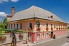 Collective enquiries Historic inn with flower decorations and traditional Austrian architecture