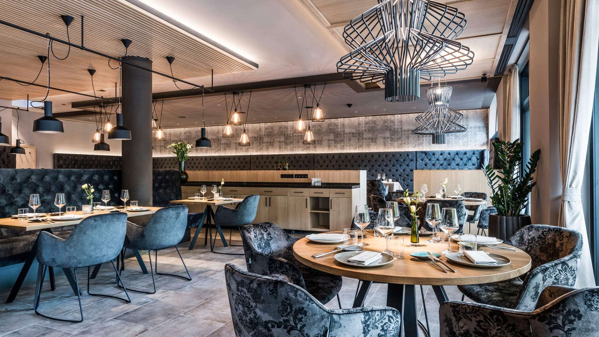 Modern restaurant interior with tables and stylish chairs